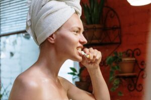 Woman brushing her teeth