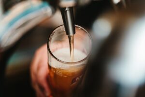 Filling glass with booze