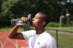 man drinking water