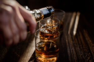 Man pouring alcohol drink